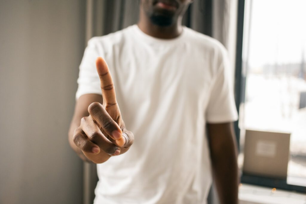 Man showing his index finger